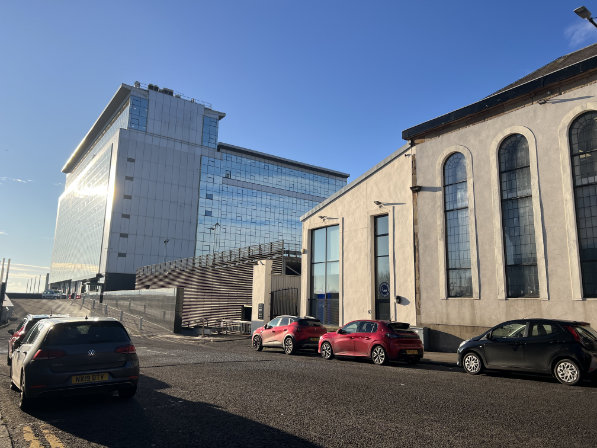 The side of the foundry on Elliot Street, with Skypark behind